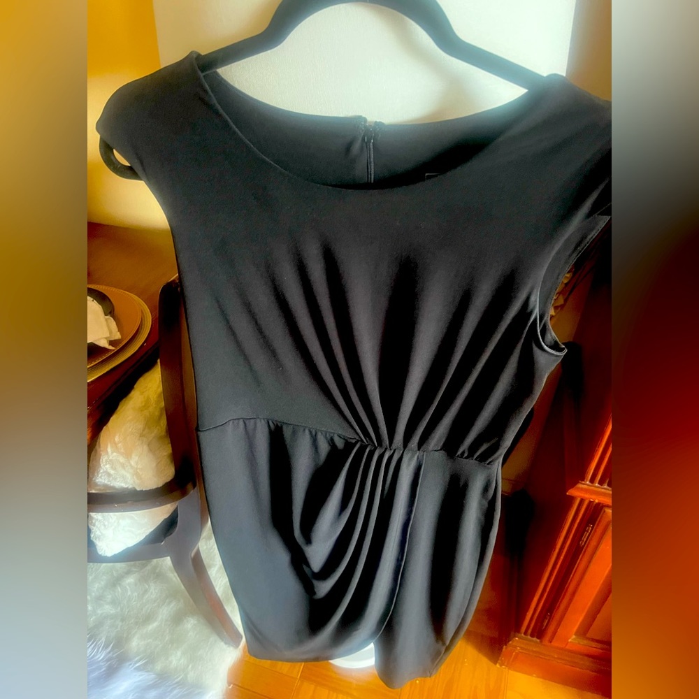 Size 6 black dress worn  a few times.